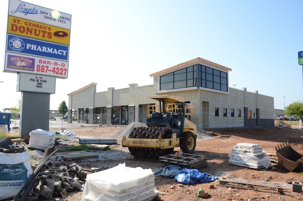Crews are working to finish a remodeling and expansion of this 3624 E. Sunshine St. retail center by mid-July.